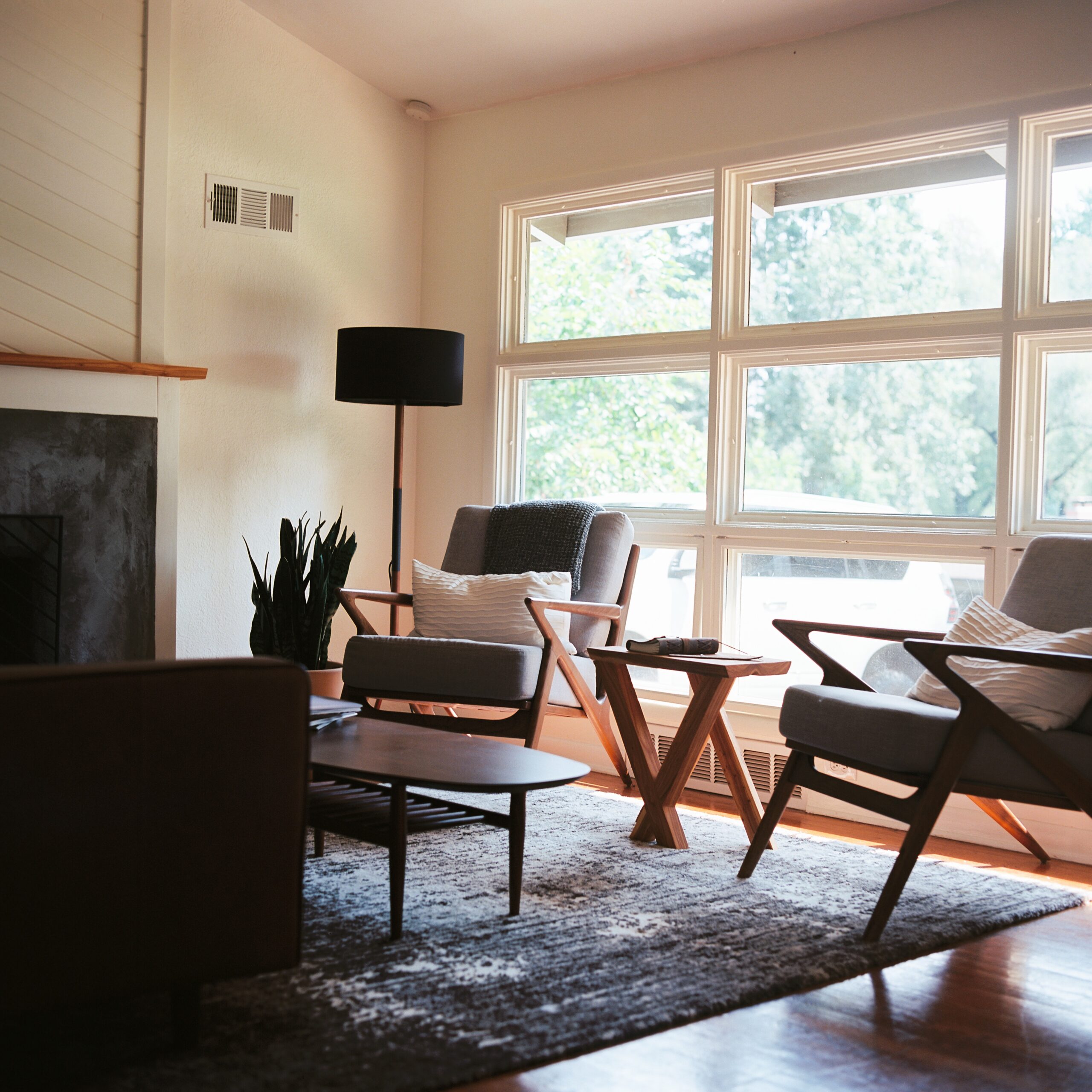 Midcentury modern living room with neutral brown tones